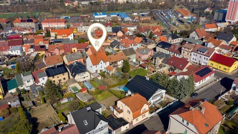 Prodej 1/2, rodinného domu 116m2, pozemek 484 m2, Bílina - ul. Síbova